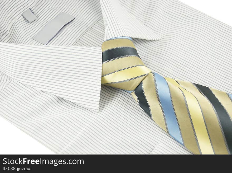 New shirt with striped necktie over white