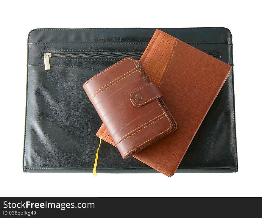 Leather folder with the diaries isolated on a white background