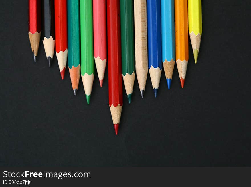 Background-color close-up image of a pencil. Background-color close-up image of a pencil