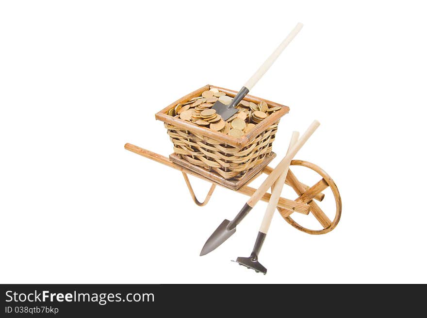 The cart of money with garden tools isolated over