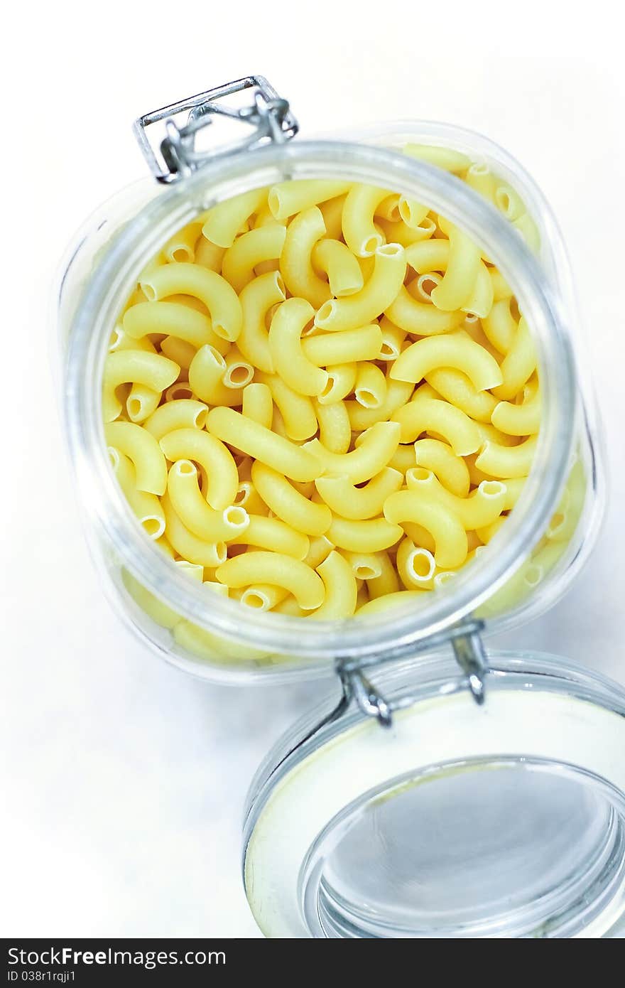 Macaroni in bottom on white