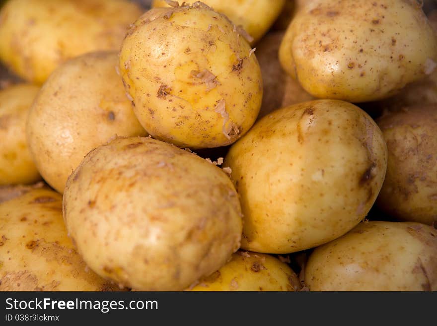 Young potatoes on the counter