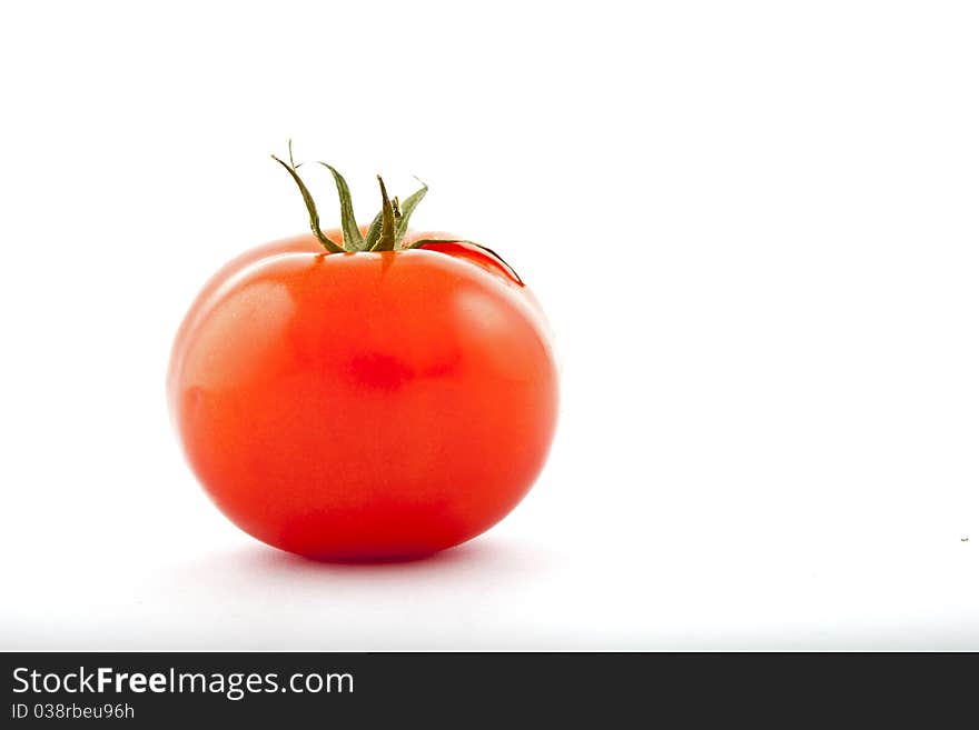 Red tomatoes on white background