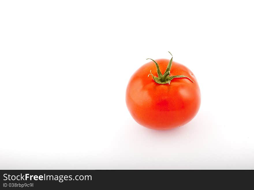 Red tomatoes on white background