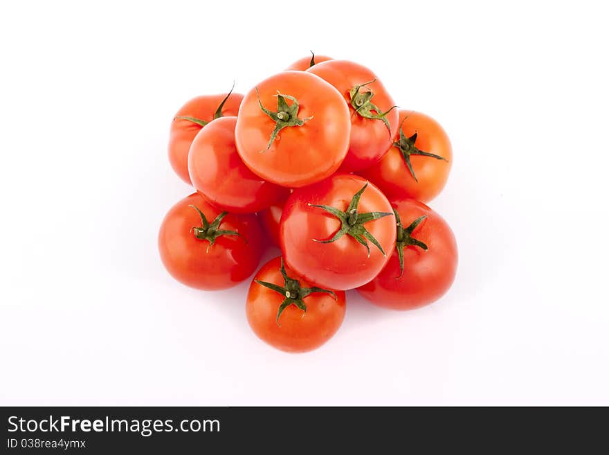 Red tomatoes on white background