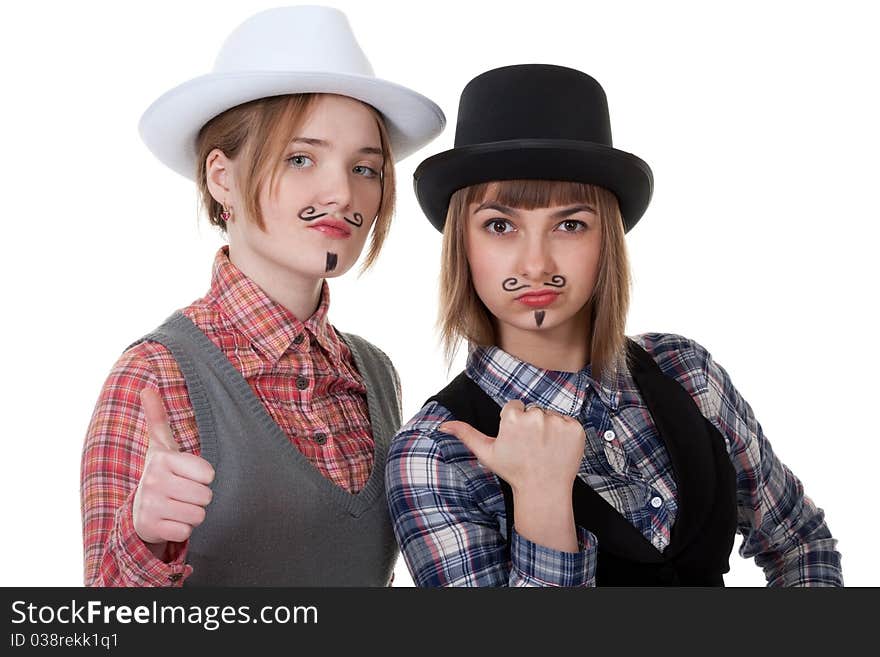 Two girls with painted mustaches and bowler hats on white background