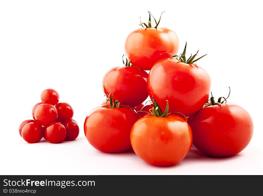 Red tomatoes on white background