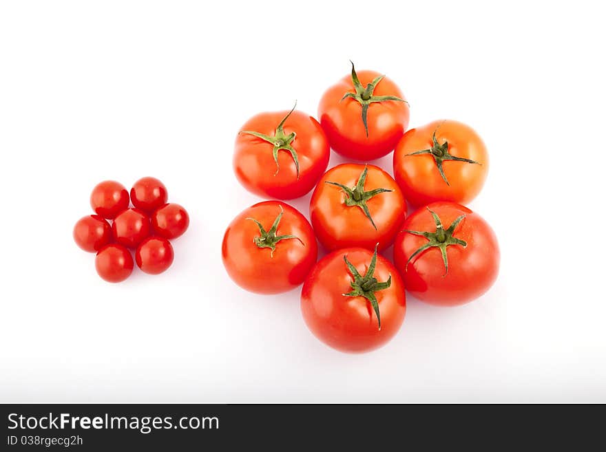 Red tomatoes on white background