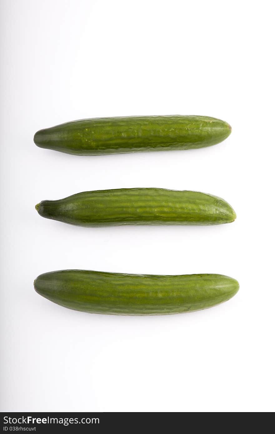 green cucumber on a white background. green cucumber on a white background