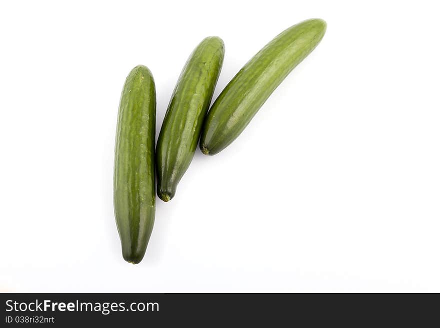 green cucumber on a white background. green cucumber on a white background