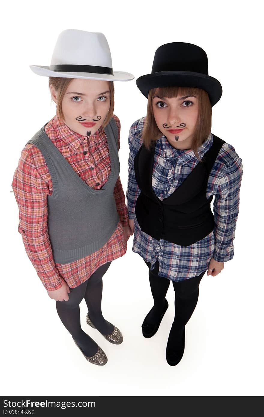 Two girls with painted mustaches and bowler hats on white background