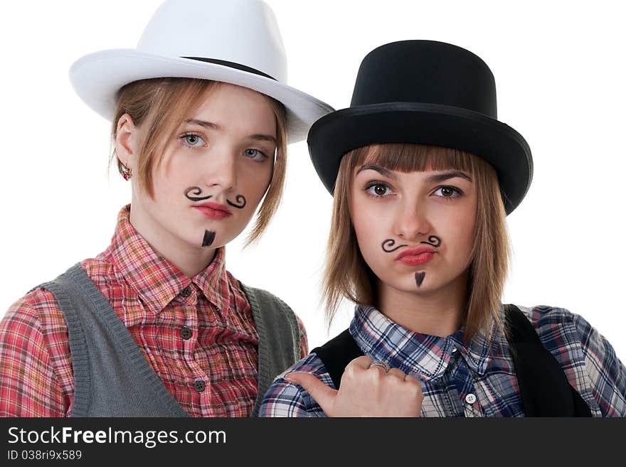 Two girls with painted mustaches and bowler hats on white background