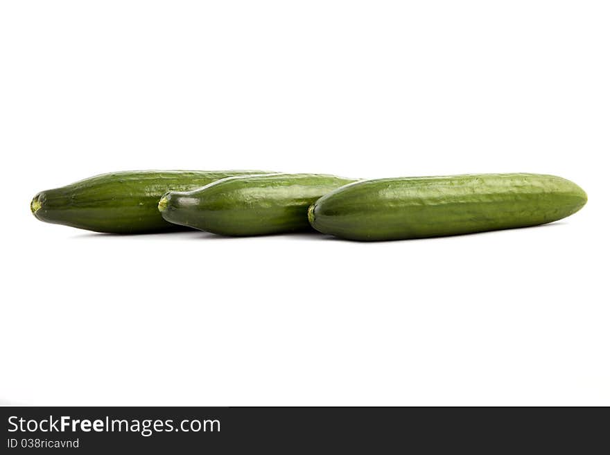 green cucumber on a white background. green cucumber on a white background