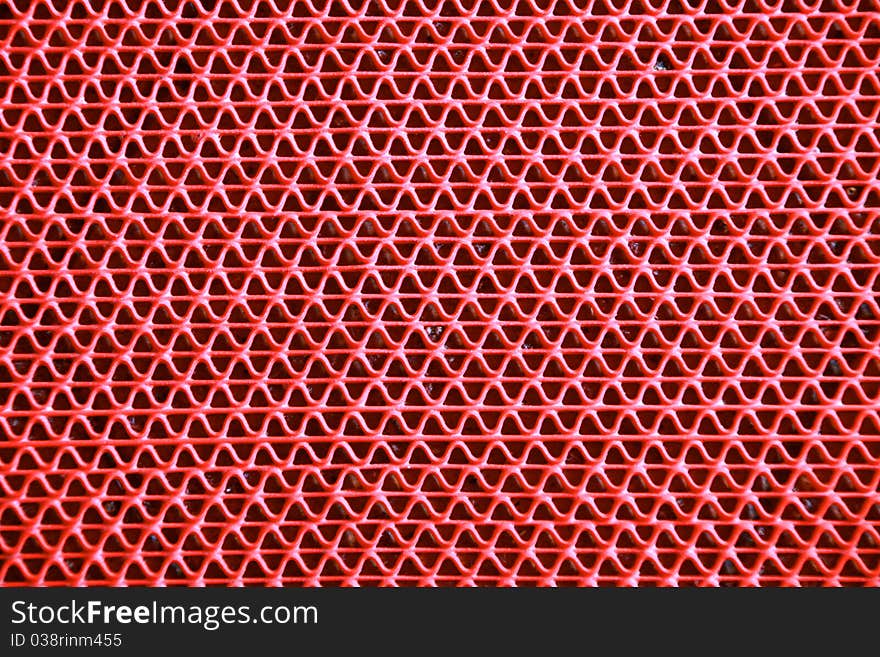 Red curly zigzag mat texture