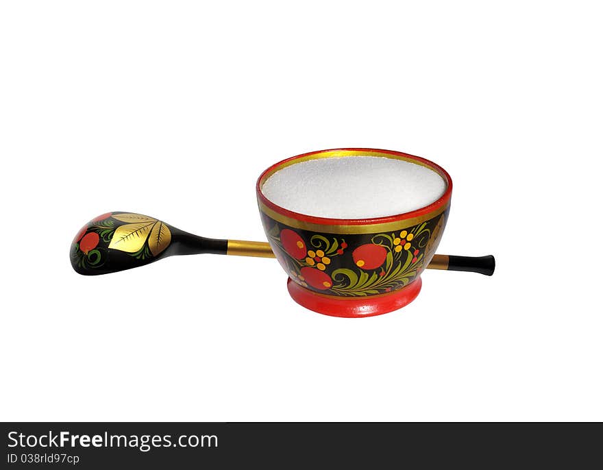 Wooden painted spoon and saltcellar with salt