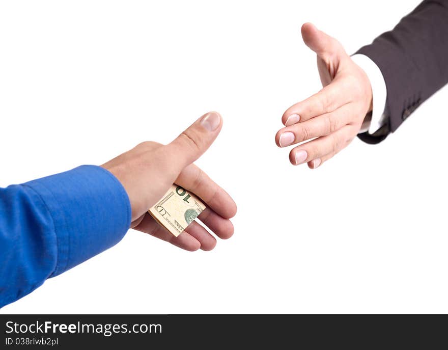 Hand shake with a denomination in a hand. Hand shake with a denomination in a hand