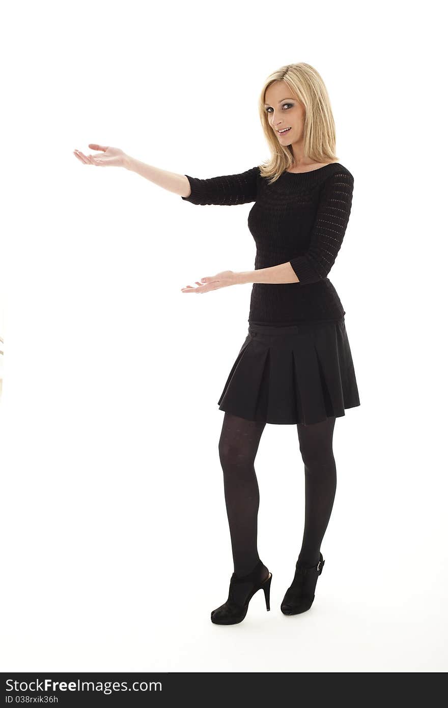 female executive in the studio wearing black on a white background. female executive in the studio wearing black on a white background