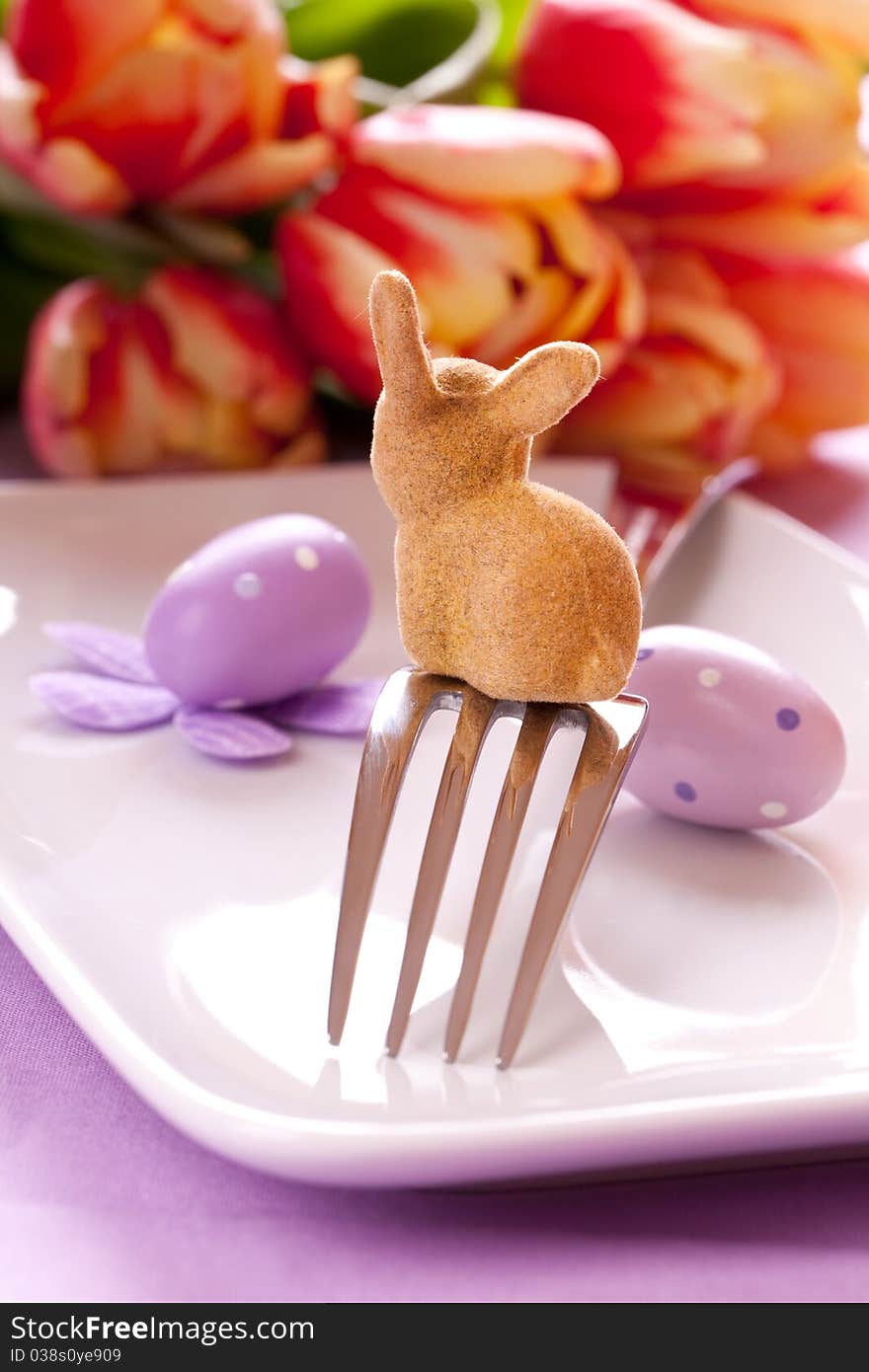 Easter table setting with easter bunny. Easter table setting with easter bunny