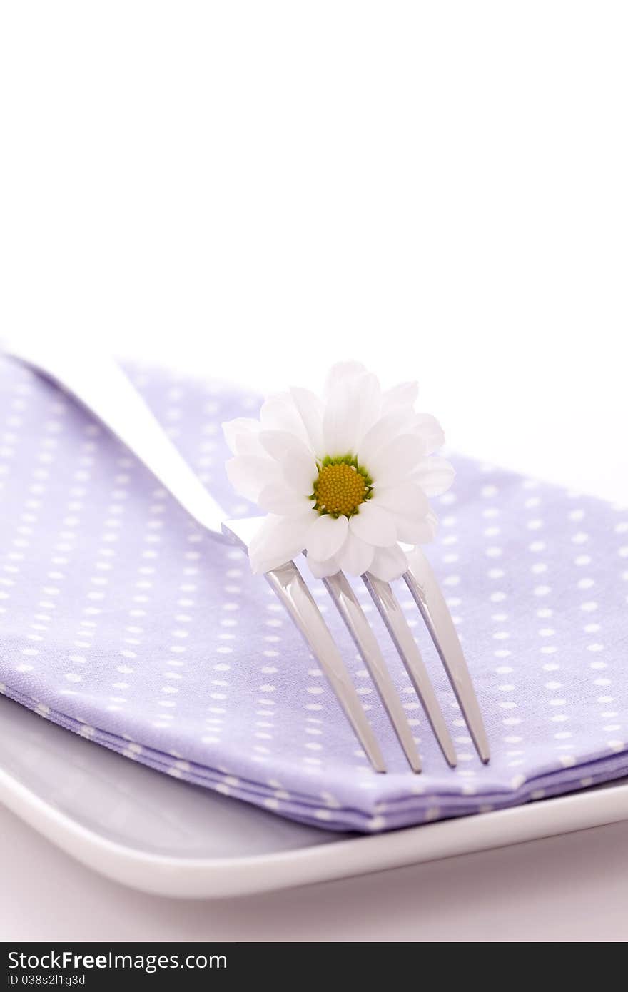 Fork with blossom isolated on white background (high key). Fork with blossom isolated on white background (high key)