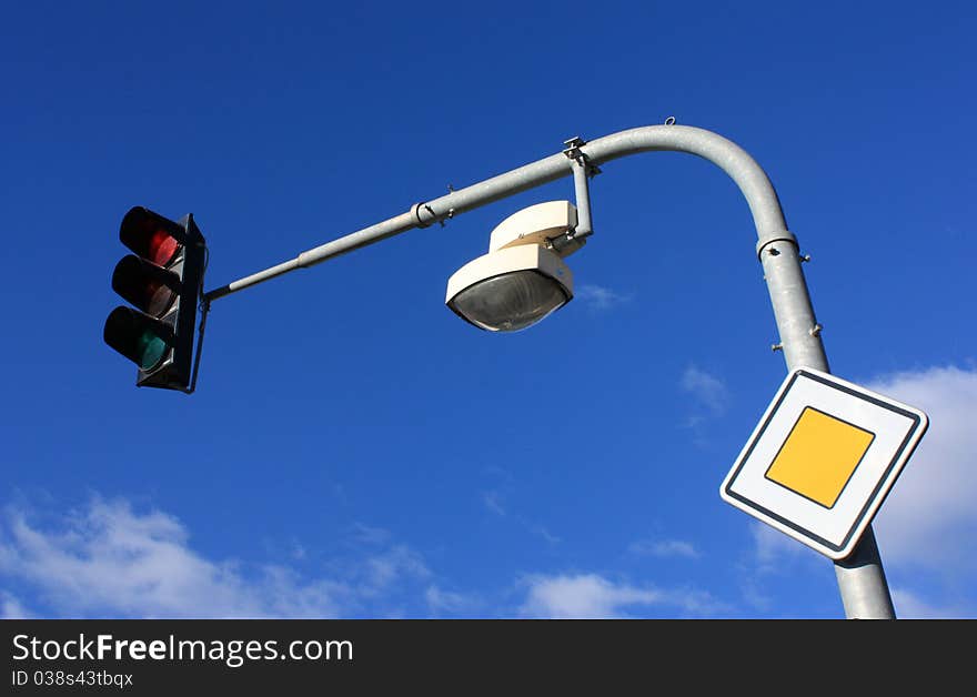 Traffic lights on blue sky