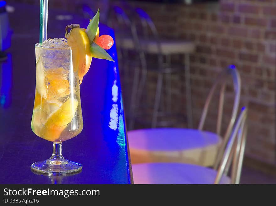 Yellow coctail drink at a restaurant