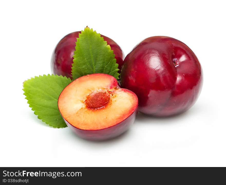 Plums isolated on white