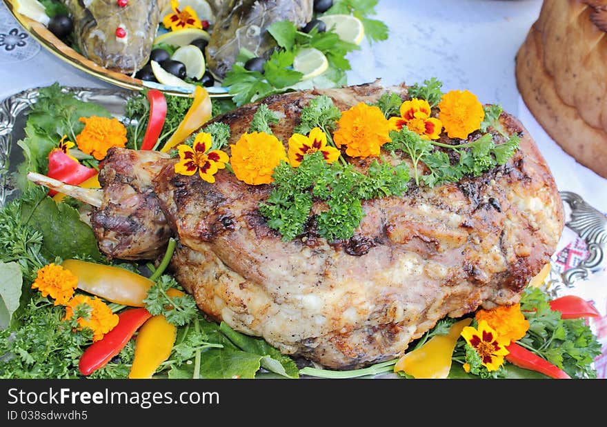 The fried piece of meat on a table. The fried piece of meat on a table