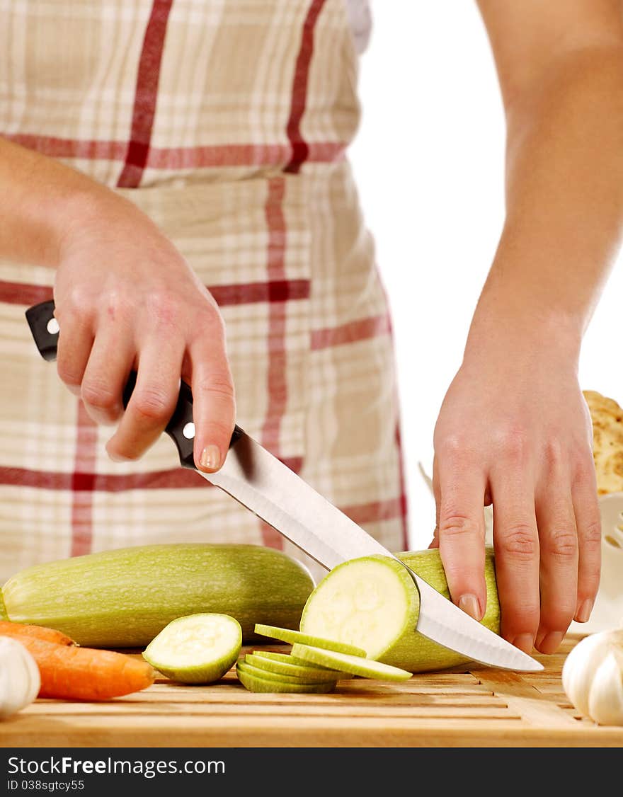 Girl cutting gourd