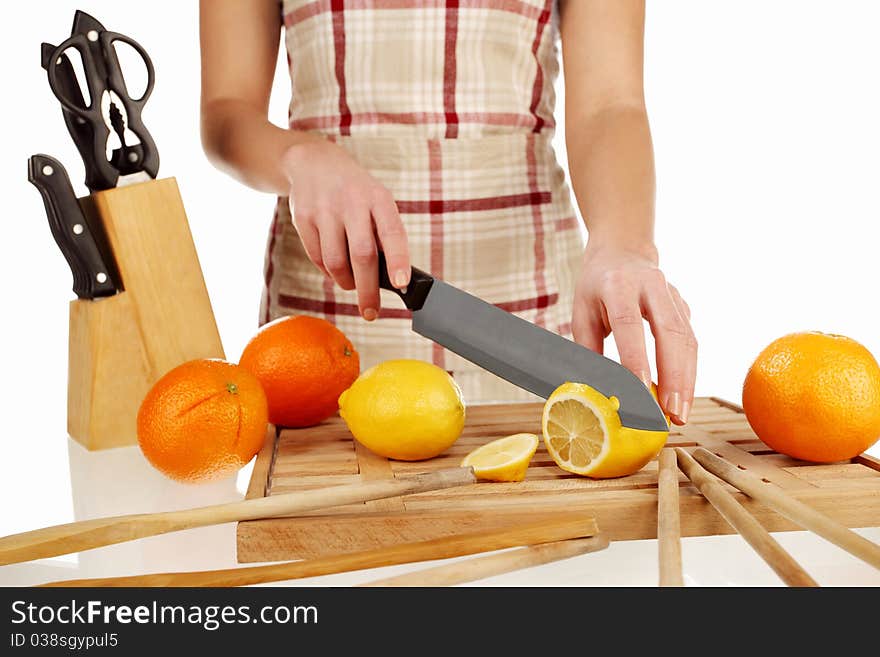 Girl Cutting Lemon In Slices 2