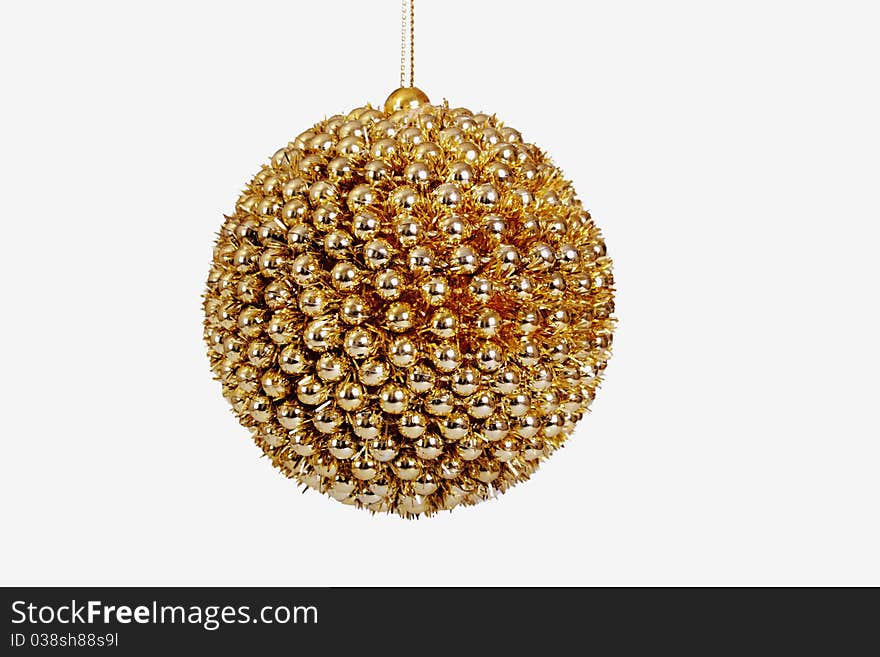 Bright golden sphere for an ornament of Christmas holidays. Bright golden sphere for an ornament of Christmas holidays