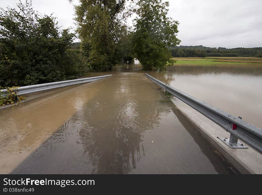 Road under the water in the floods. Road under the water in the floods.