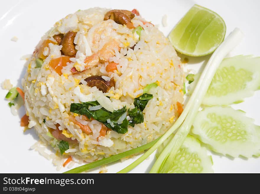 Rice with seafood in a white plate