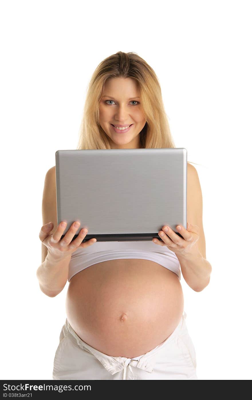 Happy pregnant woman with laptop