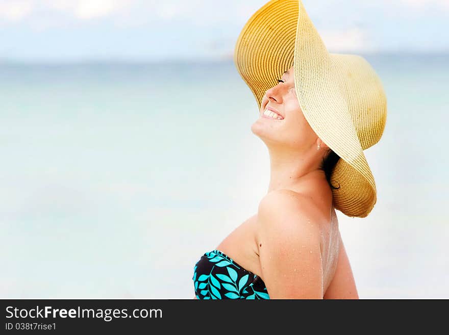 Young Woman On Sky Background