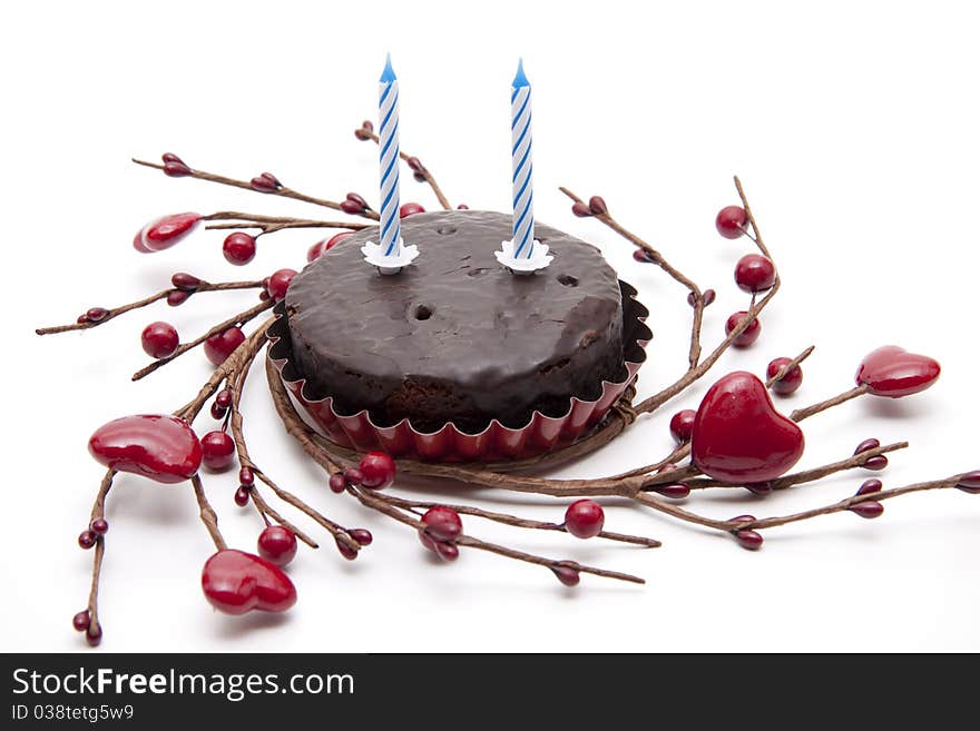 Cake with birthday candle with heart