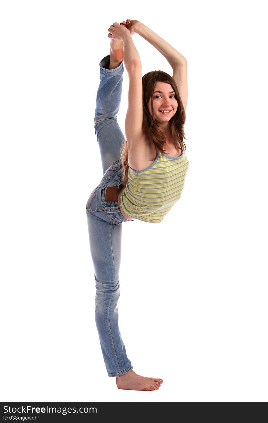 Girl in green stripy top takes leg up.