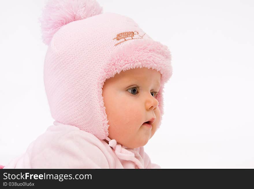 Little child baby in a pink hat