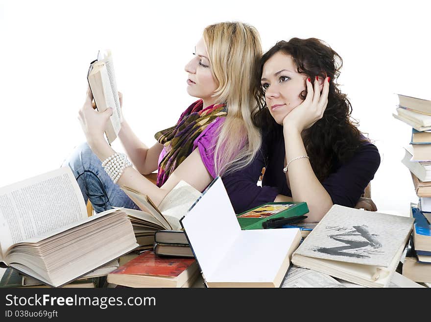 Isolated on white two girls with books