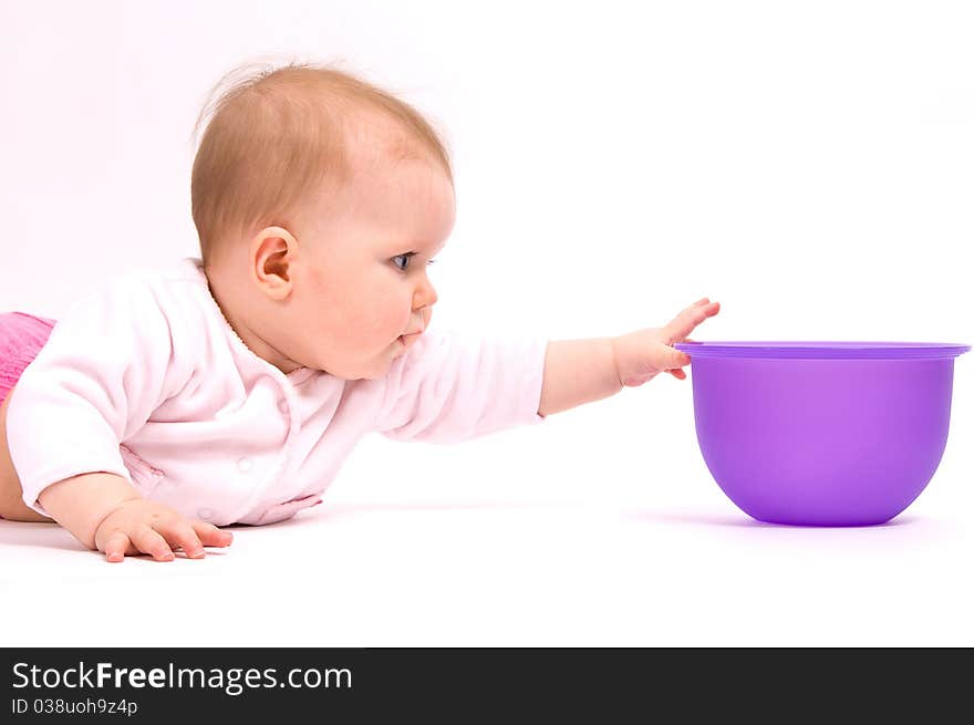 Little child baby and tableware. On white background.