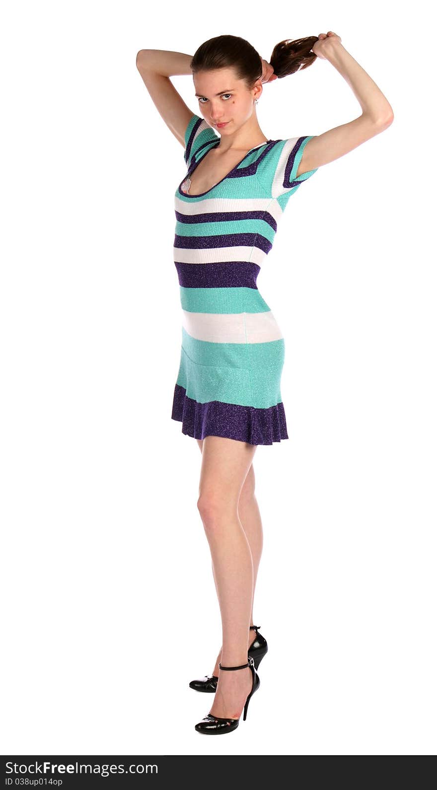 Girl In Stripy Blue Dress Holds Her Hairs.