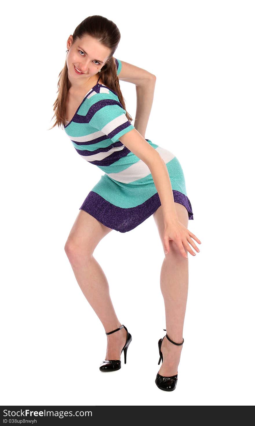 Girl in stripy blue dress dancing. Isolated on white.