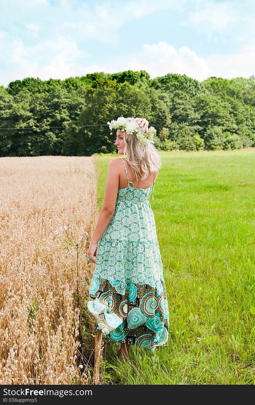 Beautiful girl on the meadow