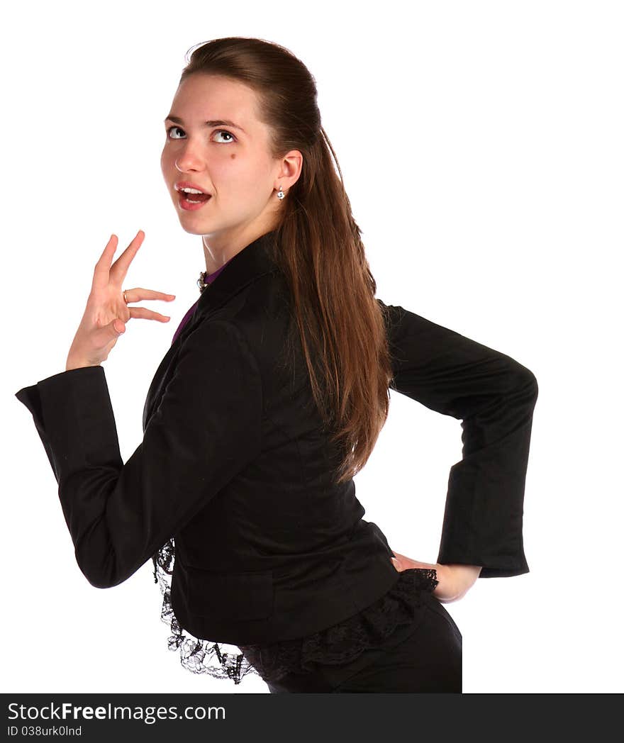 Girl in black suit posing. Isolated on white.