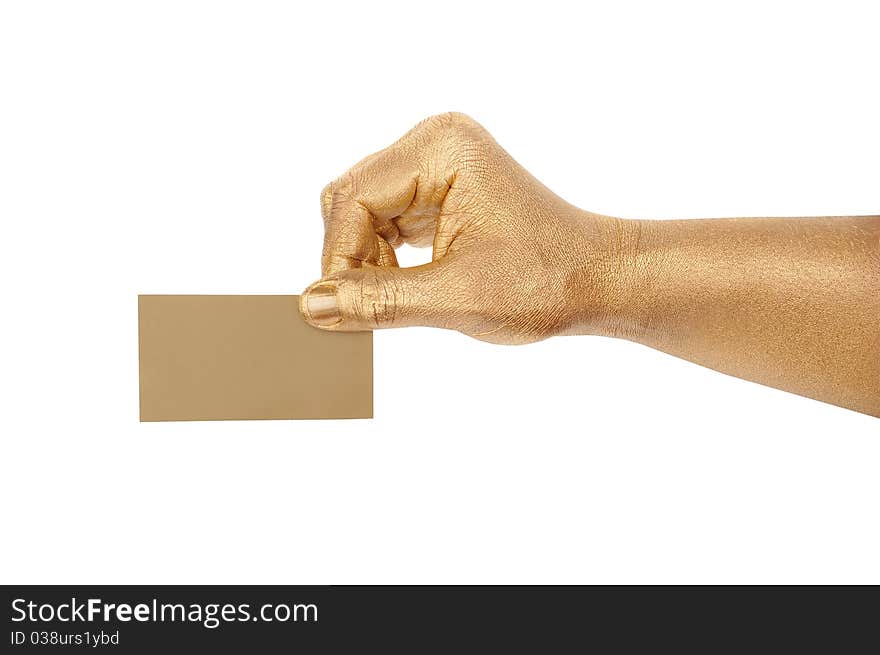 Man's golden hand holding an empty business card over white background