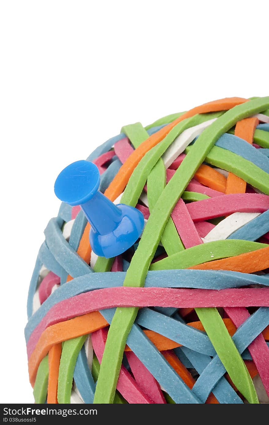 Rubber rings of different colors assembled for easy storage in a bowl with the office pins. Rubber rings of different colors assembled for easy storage in a bowl with the office pins.