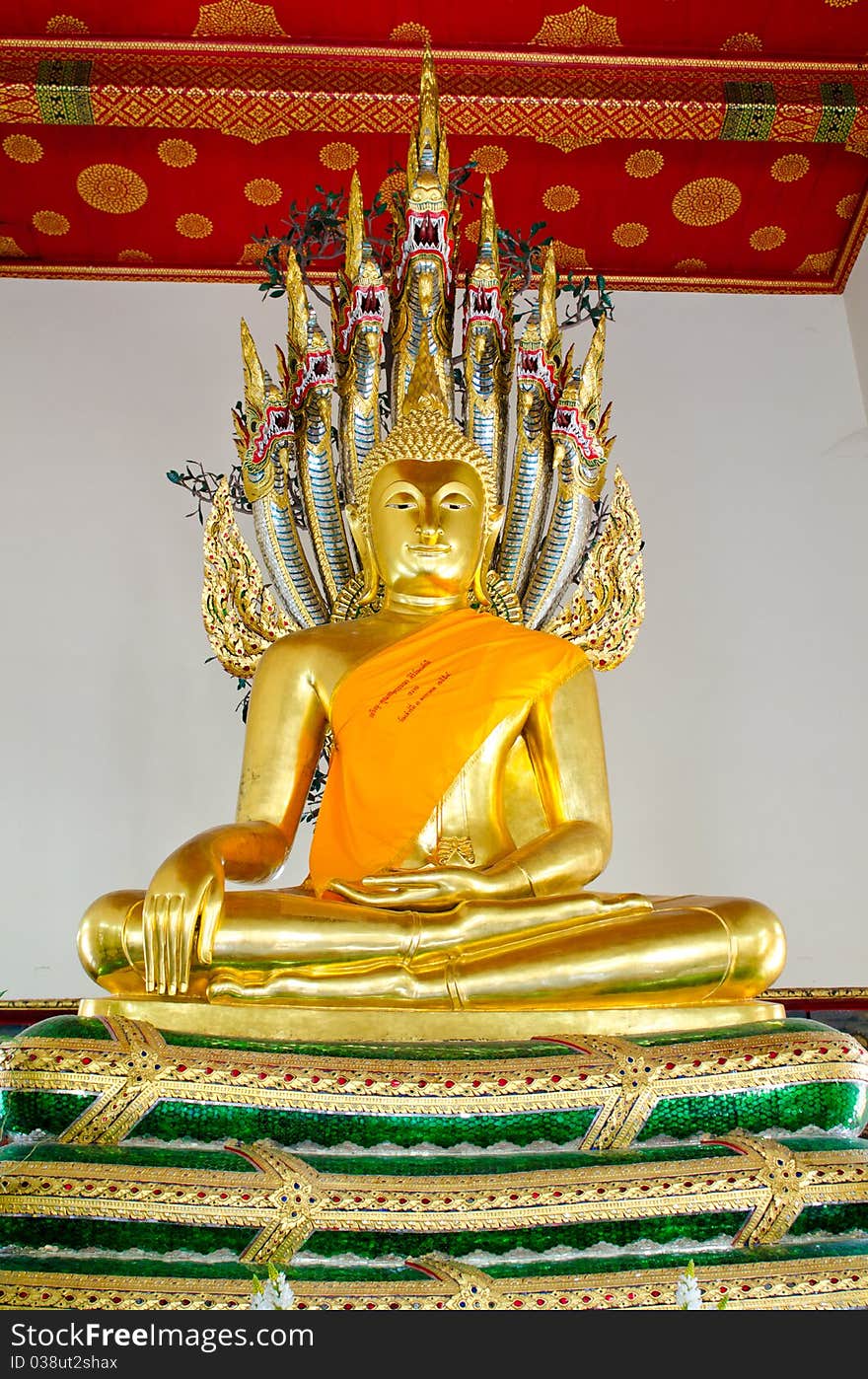 Golden Buddha with dragon heads in Bangkok. Golden Buddha with dragon heads in Bangkok