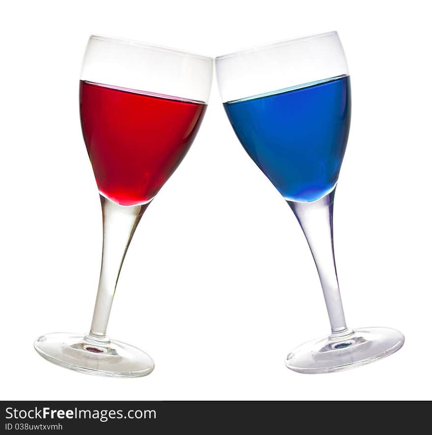 Blue and red liqueur glasses, drink, isolated on white background. Blue and red liqueur glasses, drink, isolated on white background