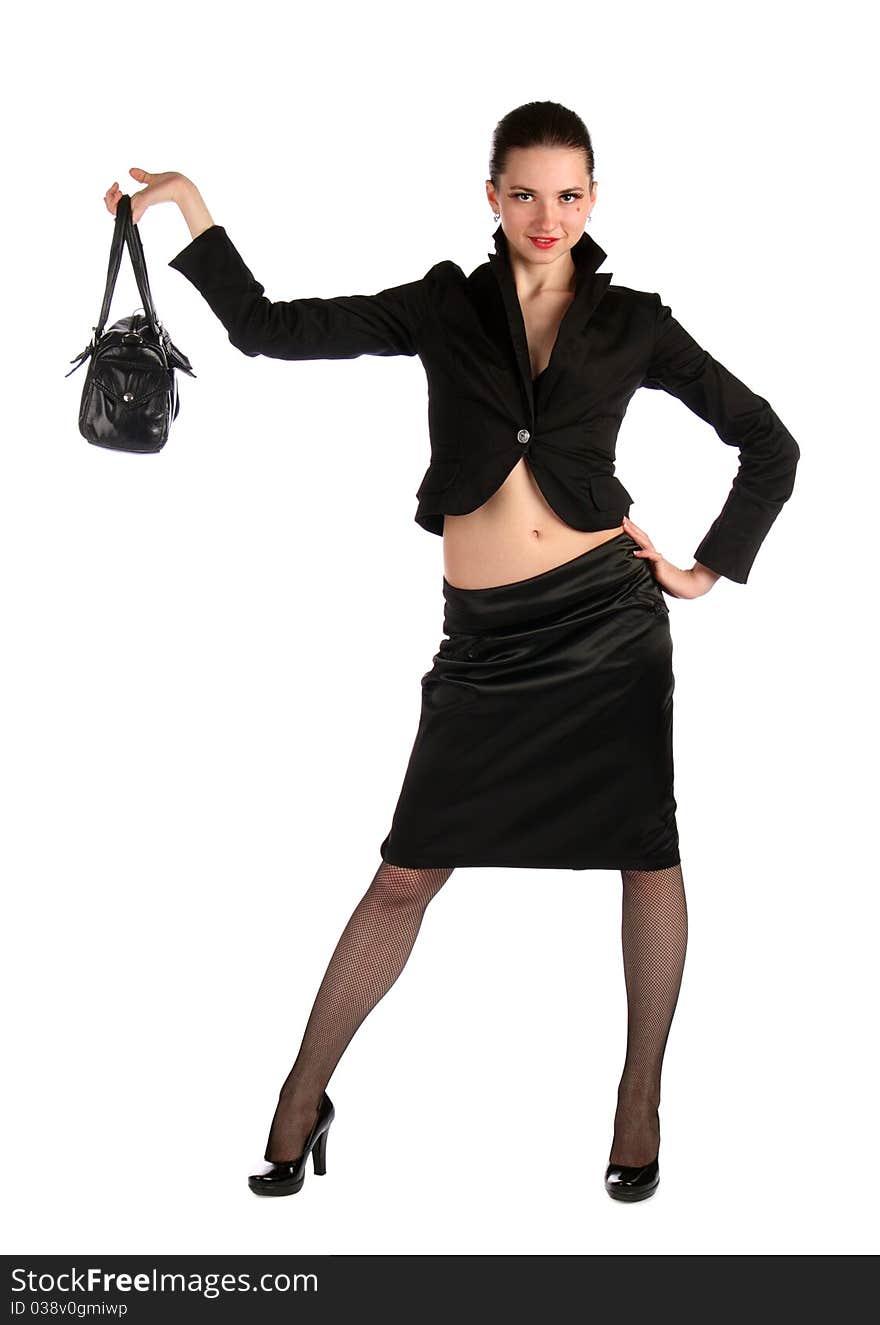 Girl in black suit demonstrate bag. Isolated on white.