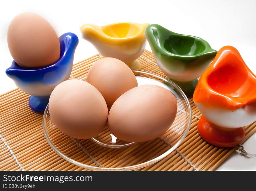 Easter eggs on the plate with holders