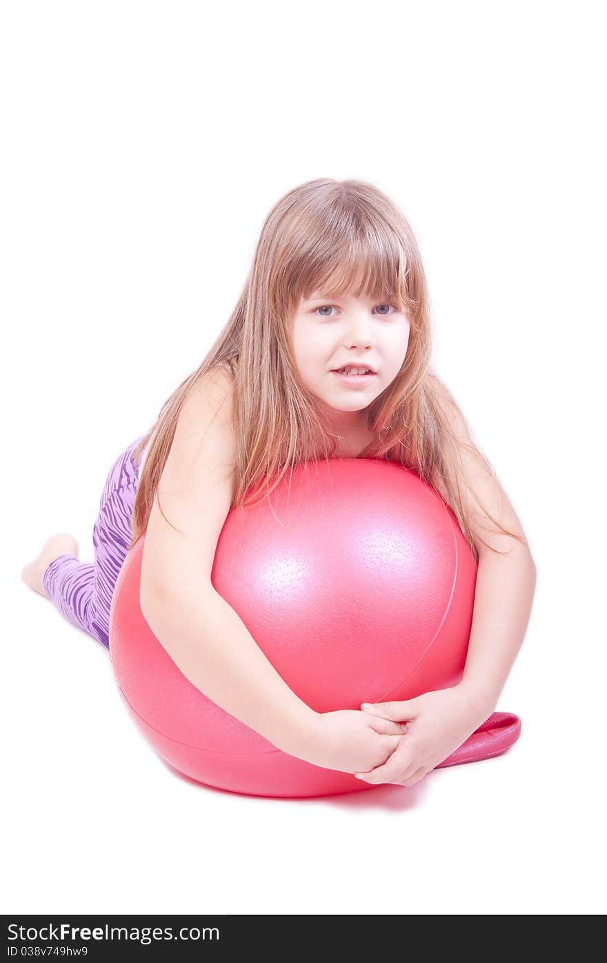 Girl exercise with a red ball isolated on white. Girl exercise with a red ball isolated on white